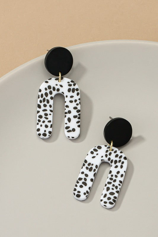 Black and white animal print arch drop earrings