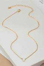 Load image into Gallery viewer, mini smiley face on a delicate chain necklace
